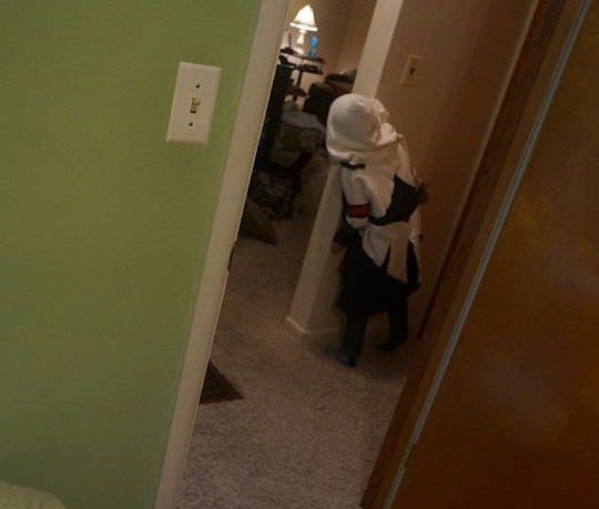 Kid dressed as Assassins Creed